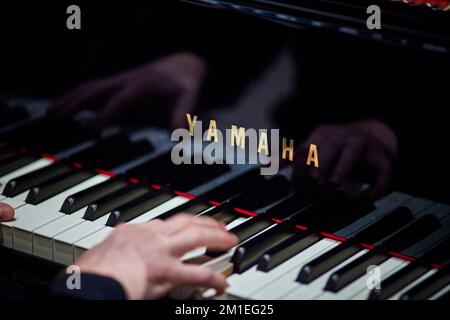 Yamaha Piano Pianist plying music keys Stock Photo