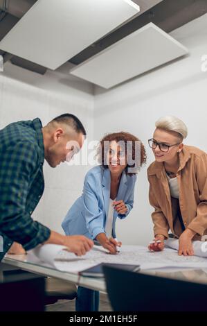 Team of engineers working on a building project Stock Photo