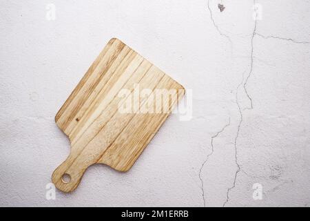 wooden chopping board on white background top down  Stock Photo