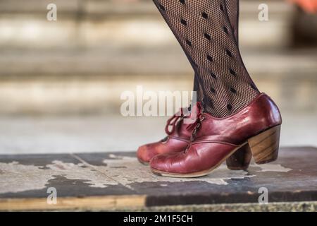 Flamenco dancers legs in red shoes close-up, Andalusia, Spain Stock Photo