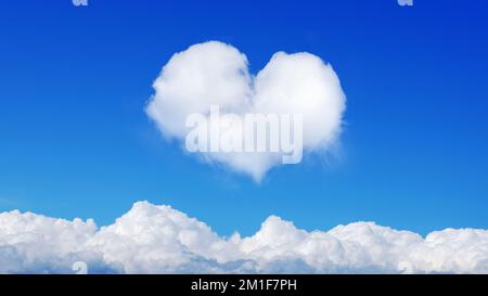 on a blue sky with a single cloud in the shape of a heart. horizontal frame. High quality photo Stock Photo