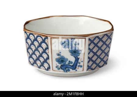 Japanese vintage decorated small ceramic bowl isolated  on white background Stock Photo