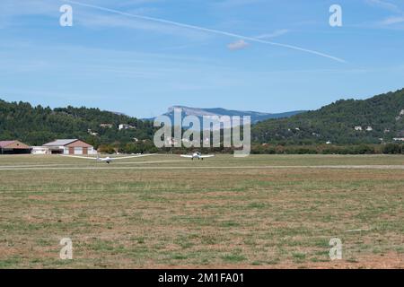 Glider being towed by a plane for take-off at Château-Arnoux-Saint-Auban Airport, France Stock Photo