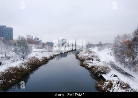 London, UK- December 2022 :  River Lea, Queen Elizabeth Olympic Park, in snow. Stock Photo