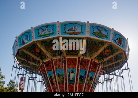 Helsinki, Finland - 24 June 2022: Ride chain carousel Ketjukaruselli in amusement park Linnanmaki Stock Photo