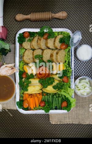 Indonesian Galantine food  is a traditional Javanese dish that has European influences consisting of meat and vegetables closeup in the plate Stock Photo