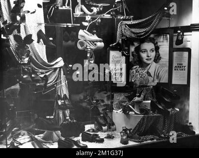 Shop Display for Messrs. Blindells Shoes for showing at the Ritz - ABC Cinema in Cleethorpes, Lincolnshire, England in 1949 of RONALD REAGAN PATRICIA NEAL and RICHARD TODD in THE HASTY HEART 1949 director VINCENT SHERMAN stage play John Patrick Associated British Picture Corporation (ABPC) / Warner Bros. Stock Photo