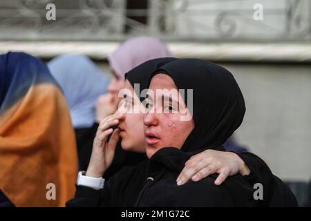 Jenin, Palestine. 12th Dec, 2022. Friends and relatives of the 15-year-old Palestinian girl, Jana Zakarneh, mourn during her funeral in the city of Jenin, in the occupied West Bank. Jana was shot dead by the Israeli army while she was on the roof of her house, during an army raid on the city. Credit: SOPA Images Limited/Alamy Live News Stock Photo