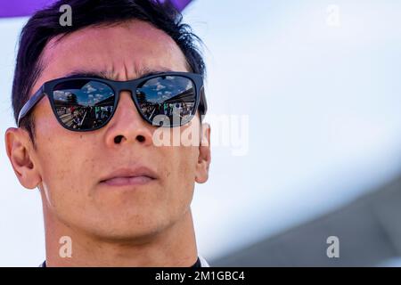 TAKUMA SATO (51) of Tokyo, Japan stands at his car during the National Anthem before the start of the Gallagher Grand Prix at the Indianapolis Motor Speedway in Indianapolis IN. Stock Photo