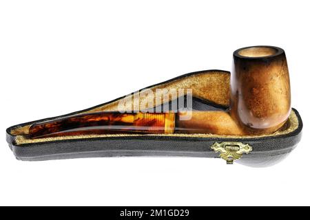 meerschaum pipe in hard case isolated on white background Stock Photo
