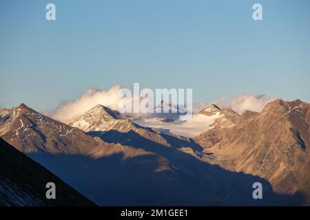 At sunset, view on Hoher Sonnblick mountain peak. Glacier. View from the west. Hohe Tauern Nationalpark. Austria. Europe. Stock Photo