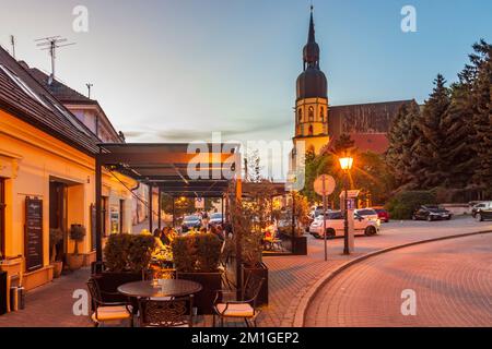 Trnava (Tyrnau): St. Nicholas's Church (kostol sv. Mikuláša), restaurant in , , Slovakia Stock Photo