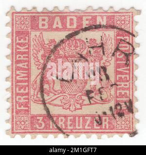 BADEN (One of the German states) — 1862: original old and rare 3 kreuzer rose postage stamp showing coat of arms with unshaded background behind Arms Stock Photo