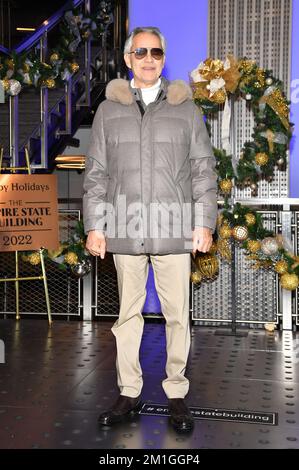 New York, USA. 12th Dec, 2022. Italian tenor Andrea Bocelli participates in the ceremonial lighting of the Empire State Building in honor of the Andrea Bocelli Foundation's 'Voices of' charity, New York, NY, December 12, 2022. (Photo by Anthony Behar/Sipa USA) Credit: Sipa USA/Alamy Live News Stock Photo