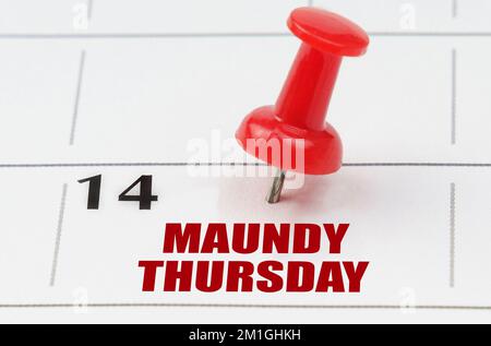 International holidays. On the calendar grid, the date and name of the holiday - Maundy Thursday Stock Photo