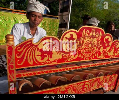 Bali, Indonesia, 29-11-2012-boy is playin the Gamelan Stock Photo