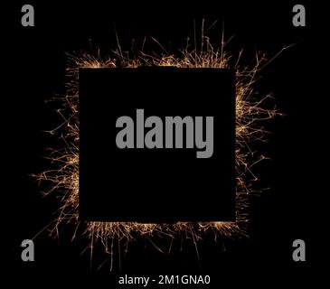 Sparkles square frame on a black background. Stock Photo
