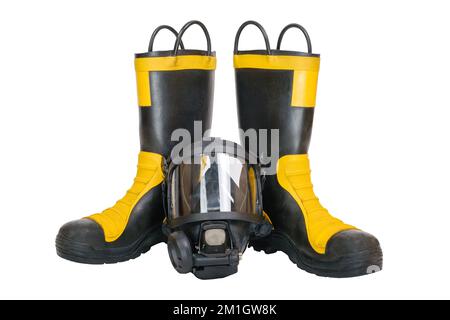 Firefighter boots and full facepiece gas mask Stock Photo