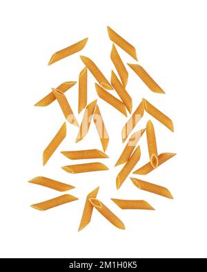 Whole grain pasta falling on a white background. Levitation. Stock Photo