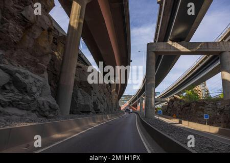 Beautiful view of road under bridge constructions. Modern technology concept. Stockholm. Sweden. Europe. Stock Photo