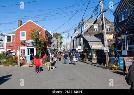 People stroll around the unique shops and boutiques on Bearskin Neck in Rockport, Massachusetts Stock Photo