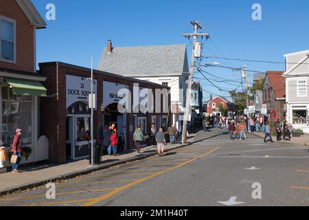 People stroll around the unique shops and boutiques on Bearskin Neck in Rockport, Massachusetts Stock Photo