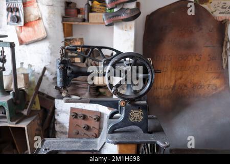 Dudley, west midlands united kingdom 15 November 2021 clasic singer sewing machine in situ at a cobblers used to stitch shoes and boots Stock Photo