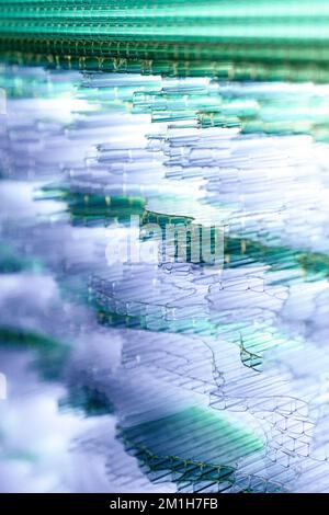 Blue and green wavy hi tech futuristic abstract glowing background concept. Stock Photo