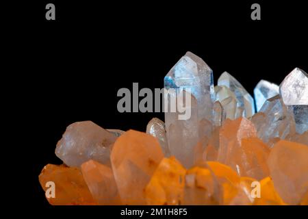Beautiful colorful precious stones in various colors on a black background. Stock Photo