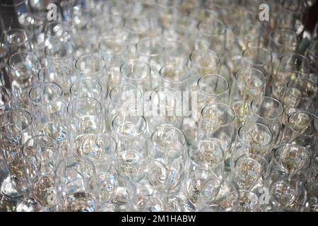 Color image of many empty wine glasses on an table. Stock Photo
