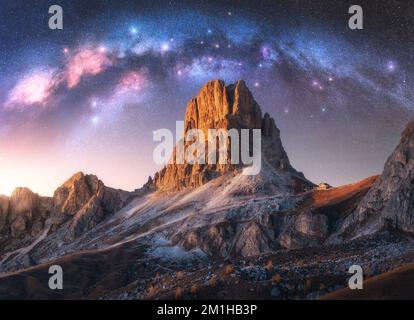 Milky Way acrh over beautifull rocks at starry night in summer Stock Photo