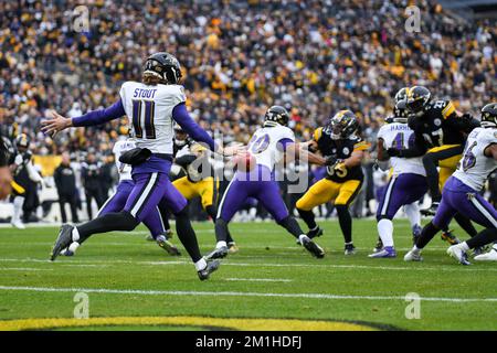 Baltimore Ravens punter Jordan Stout (11) runs off the field at