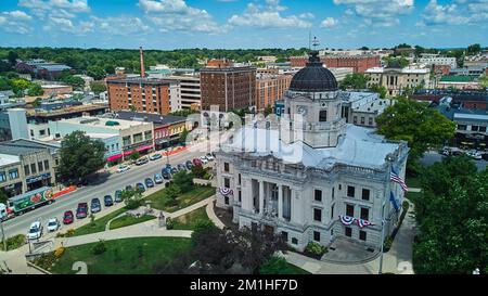 Aerial of downtown Courthouse in Bloomington Indiana with shops Stock Photo