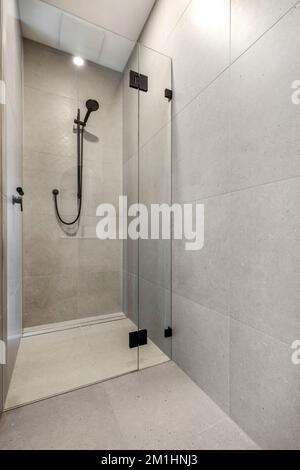 modern bathroom interior with shower and black tap wear and shower head Stock Photo