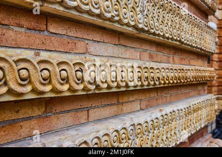 Angle looking down wall up close with detailed limestone work Stock Photo