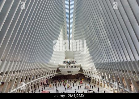 Beautiful interior of New York City subway terminal with tourists and white ribs going to glass spine in ceiling Stock Photo
