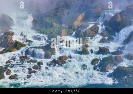 Niagara Falls up close on rocks with falls crashing over Stock Photo
