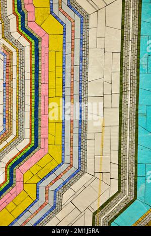 Texture asset mosaic of small colorful stones abstract straight on New York City subway Stock Photo