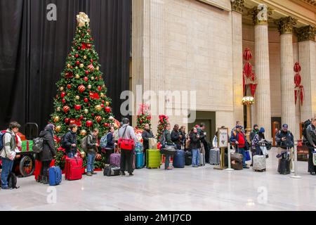 Holiday travelers lined up for tickets in the Great Hall of Chicago's Union Station. Stock Photo