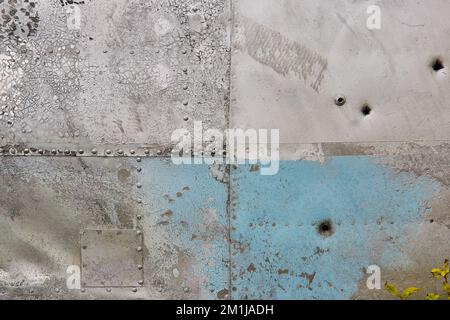 Steel sheet texture asset old and aging with peeling silver and blue paint and grid pattern Stock Photo