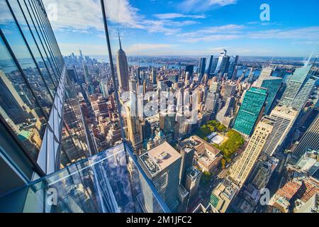 Glass floor high up over nothing in New York City looking out at city Stock Photo