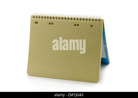 Notebook on a spring. Close-up. Isolated on white background. Stock Photo