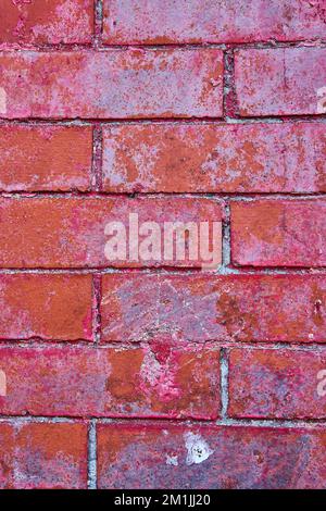 Detail of aged red brick wall with scratches and texture Stock Photo
