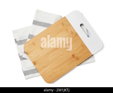 Clean wooden cutting board with napkin on white background Stock Photo