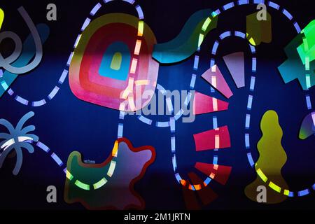 Abstract lights on wall with dashed line and shapes Stock Photo