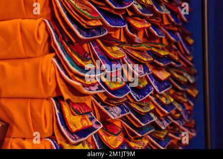 Ornate fabric inside Tibetan Mongolian Buddhist shrine Stock Photo