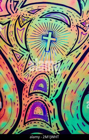 Jesus religious vibrant glowing artwork pattern on wall Stock Photo