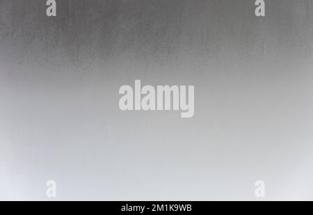 Steamy wet glass as texture or background. Humidity on window surface. Stock Photo