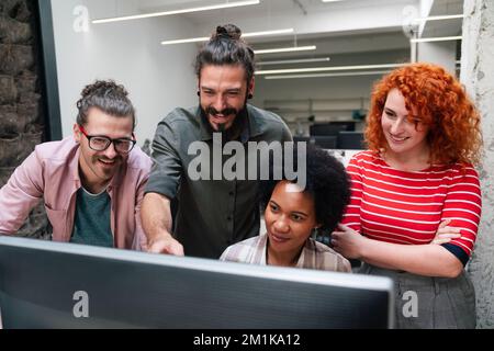 Programmers cooperating at IT company developing apps. People business work office concept Stock Photo