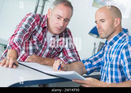 the workers in warehouse office Stock Photo